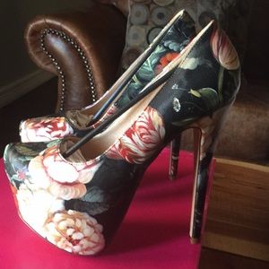 Brand new never worn heels. Still in original box.